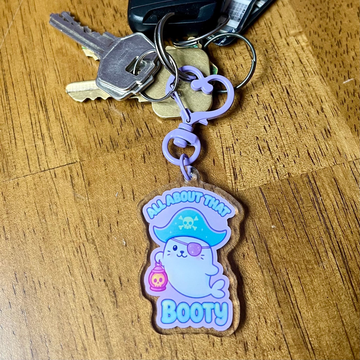 "All About That Booty" Pirate Seal Acrylic Keychain