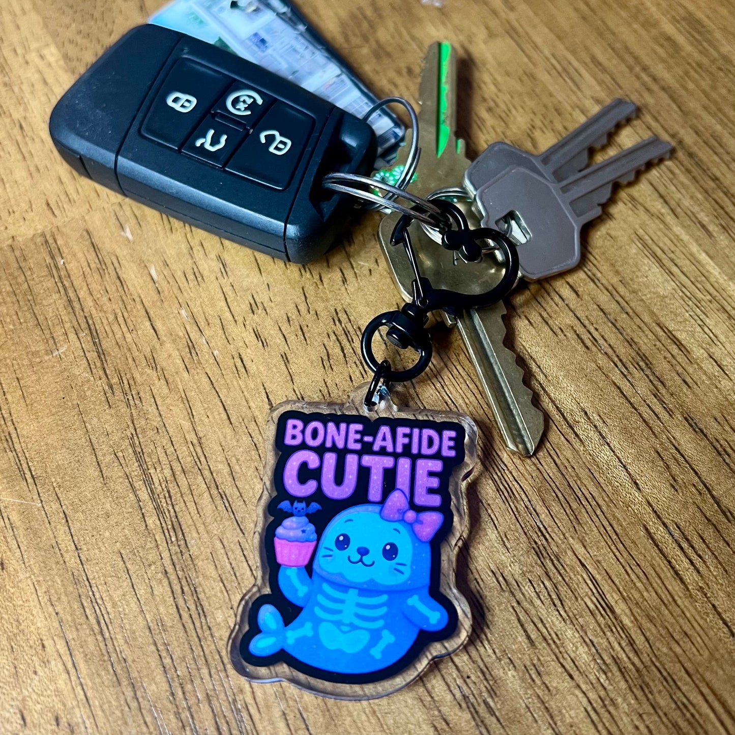 "Bone-Afide Cutie" Skeleton Seal Acrylic Keychain